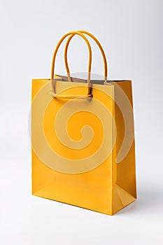 Yellow tones paper bag mock-up isolated on white.