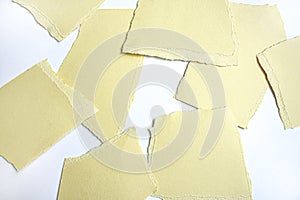 Yellow torn paper texture on mood board. Art background.