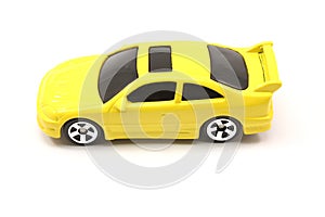 Yellow toy car coupe