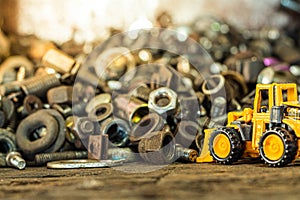 Yellow toy dump truck and typewriter tractor bulldozer