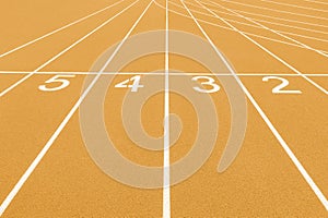 Yellow track and field lanes and numbers. Running lanes at a track and field athletic center. Horizontal sport theme poster, greet