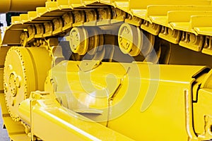Yellow tracks of the tractor or bulldozer