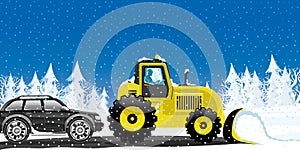 Yellow tractor removes snow. photo