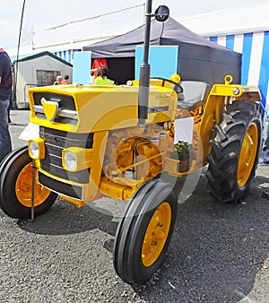 Yellow Trator at a show in Ireland fair