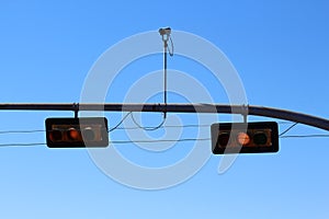 Yellow traffic light with camera