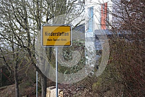 Yellow traffic sign with local town names. Niederstetten in Baden-Wurttemberg, Germany