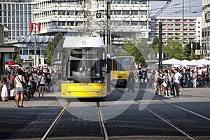 Yellow tram in at Alexanderplatz, Berlin photo