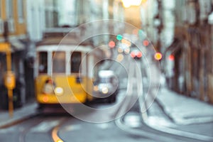 Yellow tram of the Route 28 on the street of Lisbon