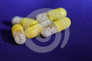 Yellow transparent capsules