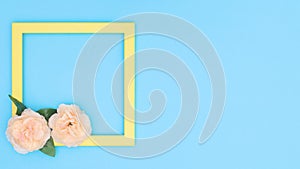 Yellow transparent frame for text appear with flowers on blue theme. Stop motion