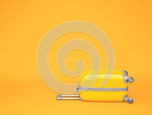 Yellow travel suitcase on orange background. Travel concept