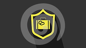 Yellow Travel suitcase with shield icon isolated on grey background. Traveling baggage insurance. Security, safety