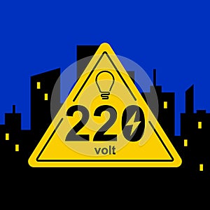 Yellow triangular sign of 220 volts
