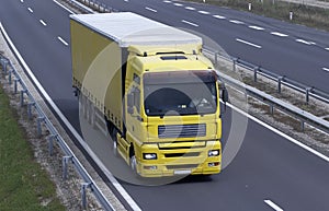 Yellow Truck on Highway