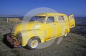 A yellow truck on the Pacific Coast Highway, California