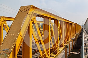 The yellow trusses of the Papar Railway Bridge photo