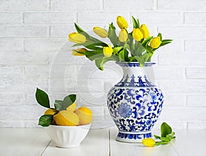 Yellow tulips in the chinese vase