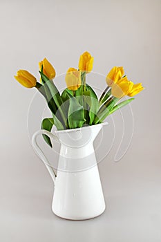 Yellow tullips in jug
