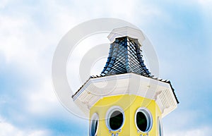 Yellow turret with blue sky