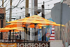 Yellow Umbrellas on a Pation Corner