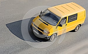 Yellow van on road