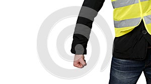 Yellow vests protests. Unrecognizable man clenched his fist protest on isolated. Concept of revolution and protest, struggle for e photo