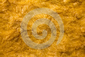 Yellow vintage fur artificial fur pattern background.