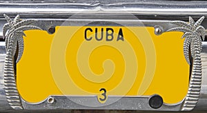 Yellow vintage numberplate, Cuba