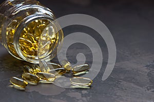 Yellow vitamin capsules, soft gelatin capsule with oily drug