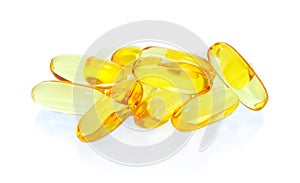 Yellow vitamin omega3 fish oil capsule on white background