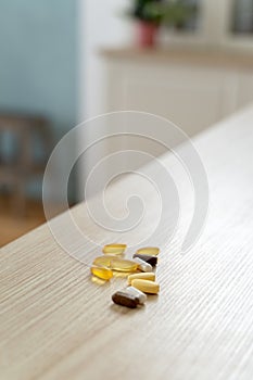 Yellow vitamins and biologically active additive are on the table