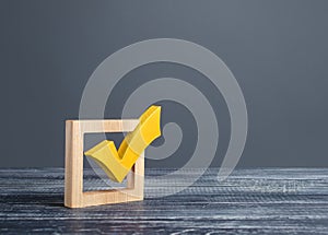 Yellow voting tick in a checkbox. Democratic institutions, vote on democratic elections, referendum. Opinion Poll. Make right