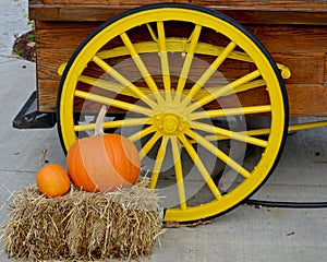 Yellow Wagon Wheel with Pumpkins