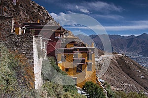 Yellow walled Sera Utse retreat of Sera Monastery , Lhasa  , Tibet photo
