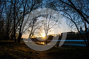 Yellow, warm sunset on the banks of the Urals, and against the embankment of the city of Orenburg