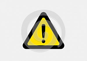 Yellow warning sign featuring a black exclamation mark inside a