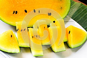 Yellow watermelon cut and served creatively