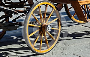 Yellow wheel olden horse carriage photo