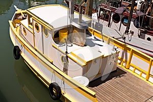 Yellow and White Fishing Boat