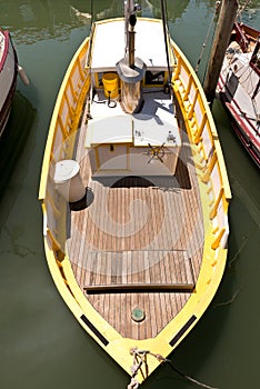 Yellow and White Fishing Boat