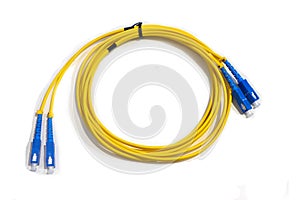 Yellow wire cable with the blue end caps on a white background