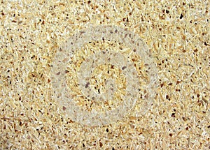 Yellow wood chipboard can be used as a background