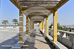 Yellow wood roofed corridor photo