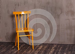 Yellow wooden chair in nterior room