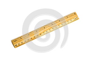 Yellow wooden ruler on a white background