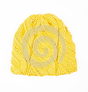 Yellow woolen cap isolated on white background