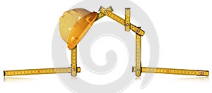 Yellow Work Helmet over a Folding Ruler in the Shape of House