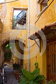 Yellow yard on street in greek town Chania. Crete