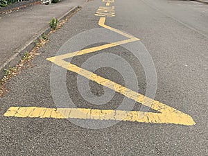 Yellow Zig Zag lines indicating to motorists to keep clear no parking