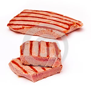 Yellowfin tuna fish steaks isolated on a white background